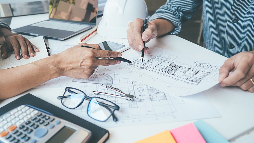 Architect Engineer Design Working on Blueprint Planning Concept. Construction Concept